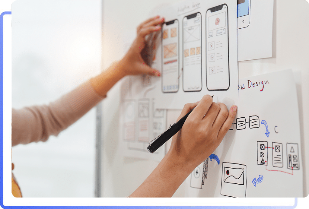 Digital marketer planning client strategy on a whiteboard